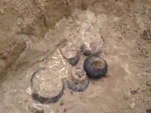 Professor of the Institute of Archeology and Ethnography of ANAS, Doctor of Historical Sciences Arif Mammadov while giving information during archeological researches in the barrow discovered in the territory of the Keshikchidagh caves complex