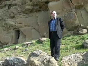 Associate professor of BSU Yunis Nasibov presents interesting historical information about "Keshikchidagh caves complex"